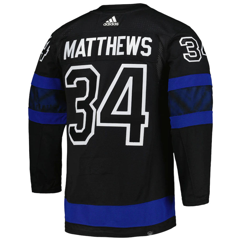 Auston Matthews reacts to putting on the (new) Leafs jersey for