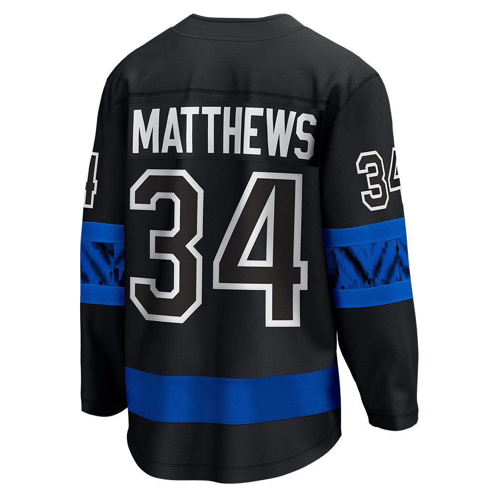 Auston Matthews reacts to putting on the (new) Leafs jersey for